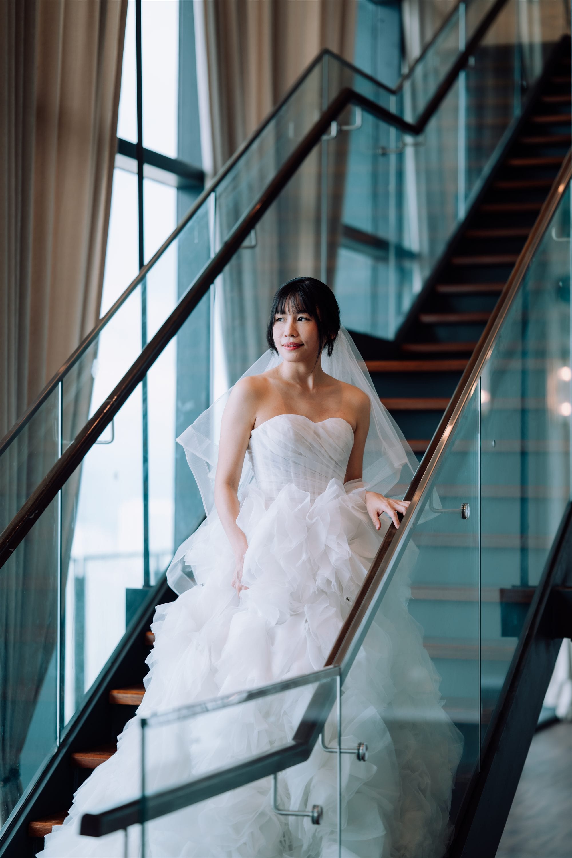 Bride portrait on staircase at W. in the Sky KL